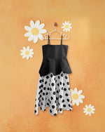 Black polka peplum gown